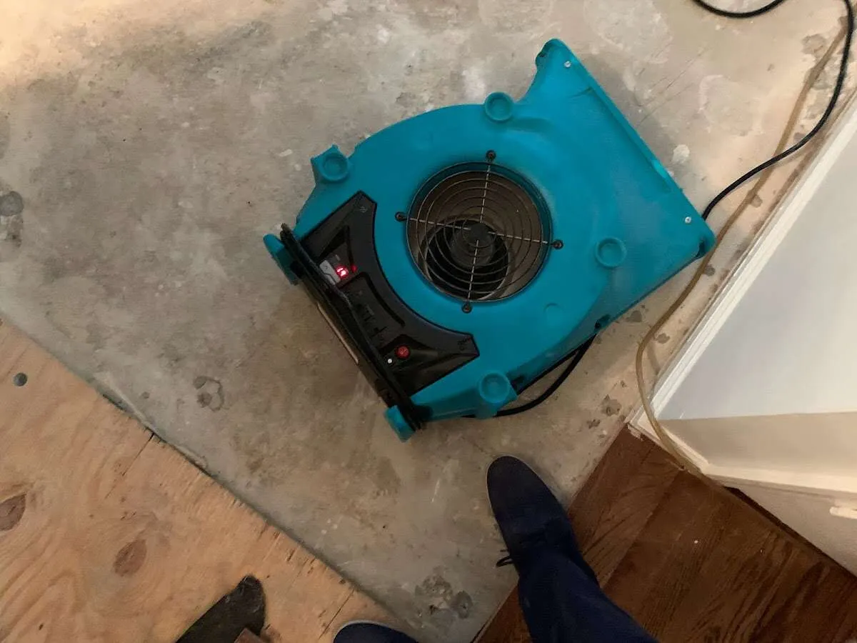 Air mover drying subfloor during Leak Detection & Repair in River Vale